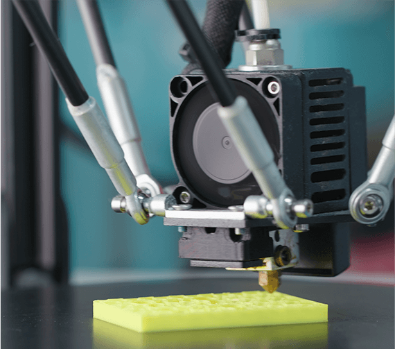 a 3d print head extruder in action