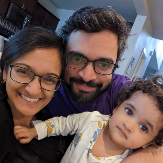 A photograph of Pradeep with his wife, Modhurima, and daughter, Sanjana.