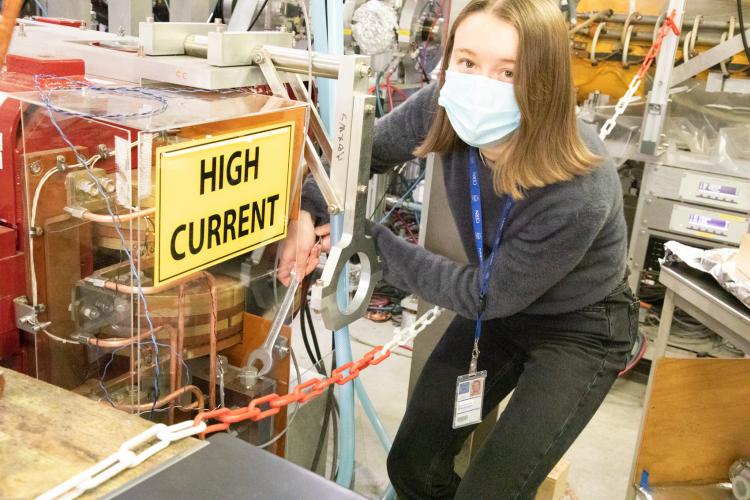 Danielle connecting a test magnet for ALPHA-g magnet control