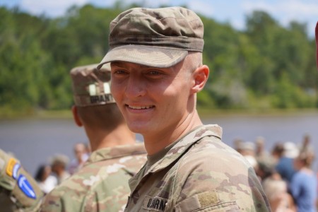 Pfc. Chase Cammanga smiles during his graduation ceremony from Army Ranger School June 21, 2024. Cammenga is the first Michigan Army National Guard Soldier to complete the Ranger Team Leader Initiative training program for enlisted Soldiers in the...
