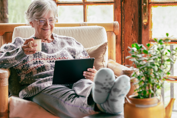 A woman reading on a tablet