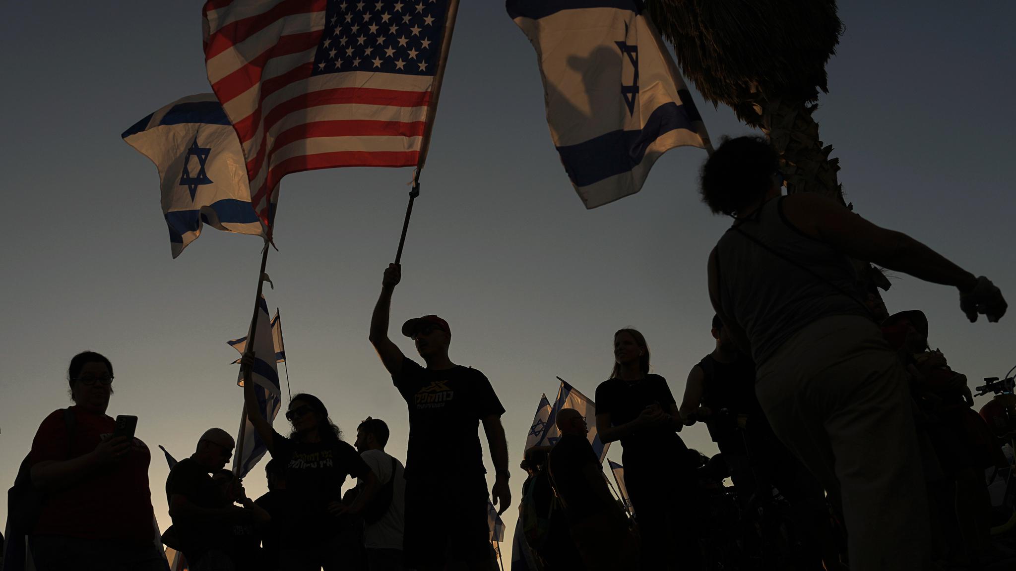 Israelis protest the government's planned judicial overhaul in Tel Aviv, on July 18.