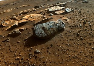 Two holes are visible in the rock, nicknamed “Rochette,” from which NASA’s Perseverance rover obtained its first core samples. The rover drilled the hole on the left, called “Montagnac,” Sept. 7, and the hole on the right, known as “Montdenier,” Sept. 1.