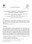 Research paper thumbnail of An experimental examination of intensity fluctuations of a host droplet containing an inclusion