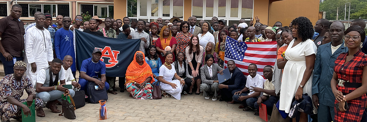 Group photo of STEP Program participants outside of training center. 