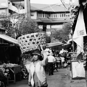 Woman carrying big basket