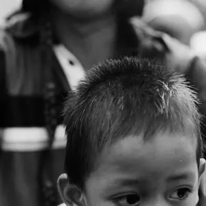 Shy boy on motorbike