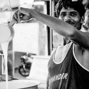 Man pouring liquid