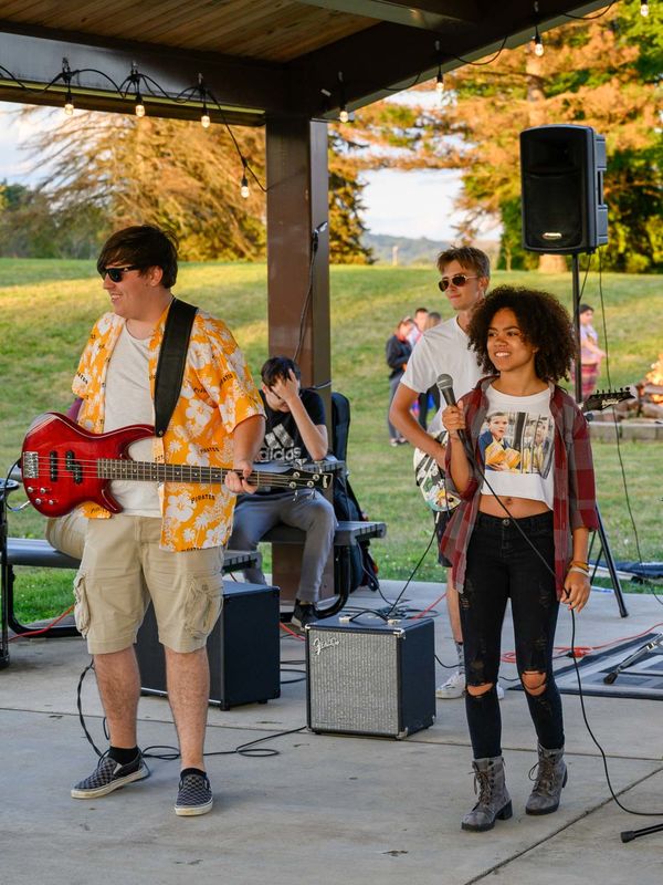 students perform in a band