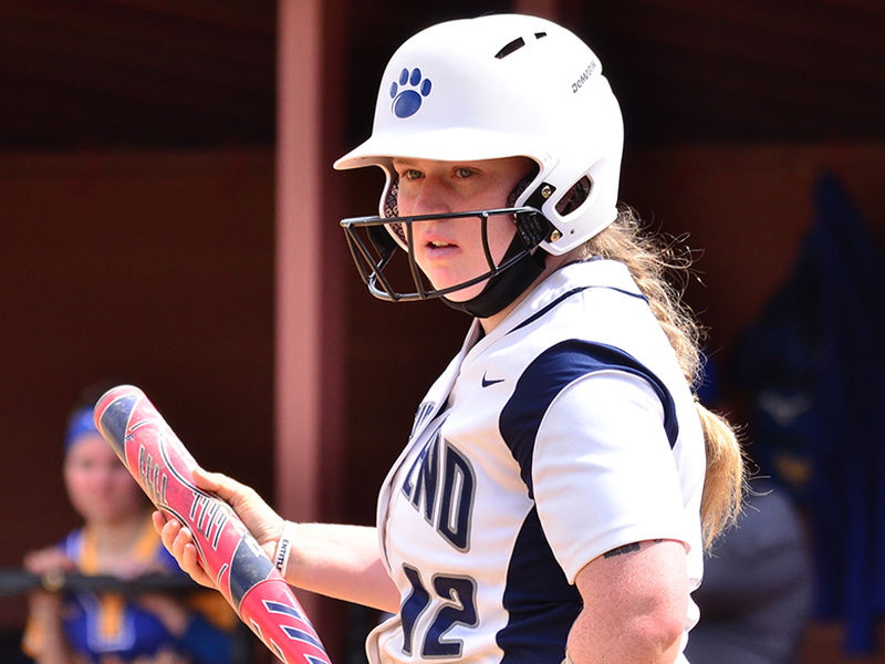 Behrend women's softball player at bat.