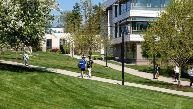 Photo of students walking on campus