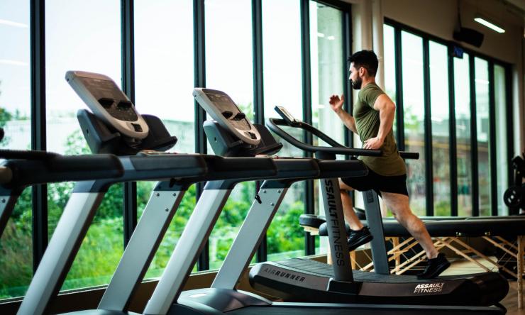 A person running on a treadmill.