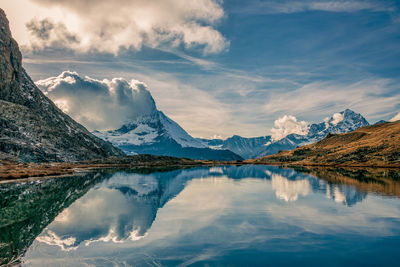 Panoramic view of matterhorn peak, switzerland. matterhorn reflection in the riffelsee.