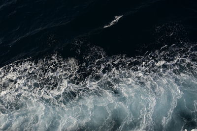 High angle view of waves in sea