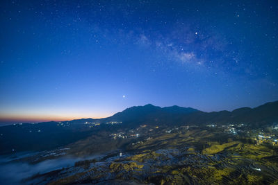 Milky way of yuanyang rice terrace at dawn, yunnan, china