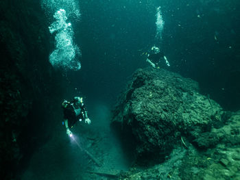 People swimming in sea