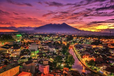 High angle view of townscape against sky during sunset