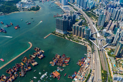 Aerial view of cityscape by bay