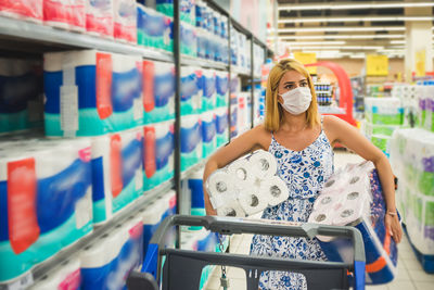 Portrait of woman standing in store