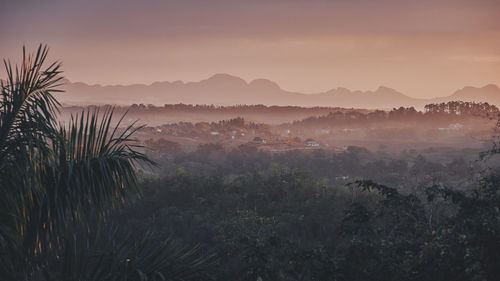 Scenic view of mountains against sky during sunset