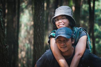 Portrait of happy smiling couple in forest