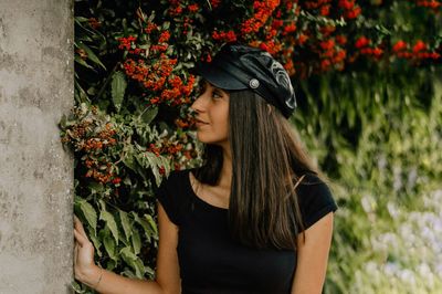 Beautiful woman wearing red flower