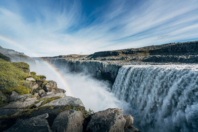 View of waterfall against sky