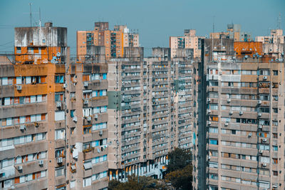 Low angle view of buildings against clear sky