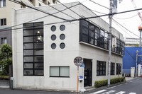 The Fukagawa Tokyo Modan Kan culture center, formerly the Tokyo City Fukagawa Shokudo dining facility, with round, as well as vertically and horizontally long windows, is seen in the capital's Koto Ward on May 17, 2022. (Mainichi/Akihiro Ogomori)