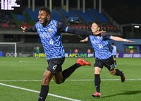 Jesiel (4) celebrates with Yu Kobayashi after scoring Kawasaki Frontale's third goal in the second half of their Asian Champions League Elite match against Shandong Taishan at Todoroki Stadium in Kawasaki, near Tokyo, on Dec. 4, 2024.