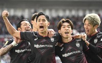 Taisei Miyashiro (2nd from R) celebrates with teammates Yoshinori Muto (3rd from R) and Yuya Osako (far R) after opening the scoring for Vissel Kobe in the first half of their J-League first-division game against Shonan Bellmare at Noevir Stadium Kobe on Dec. 8, 2024. (Kyodo)