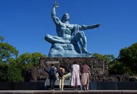 People offer prayers in front of the Peace Statue in the city of Nagasaki in this October 2024 file photo. (Mainichi/Kota Yoshida)