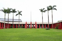 The Nakijinson Central Public Hall is built embracing a broad lawn, as seen in the village of Nakijin, Okinawa Prefecture, on June 8, 2022. (Mainichi/Shinnosuke Kyan)