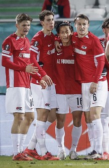 AZ Alkmaar's Seiya Maikuma, second from right, celebrates his first goal for the club with his teammates during a Europa League league-phase match against Ludogorets in Razgrad, Bulgaria, on Dec. 12, 2024. (Kyodo)