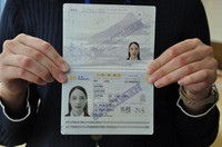 A sample of the new Japanese passport is seen in this image taken in Tokyo's Chiyoda Ward on Dec. 20, 2024, with a plastic page displaying the holder's photo. (Mainichi/Kim Suyeong) 