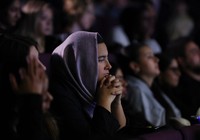 A student listens to a hibakusha's testimony with a serious look at Kuben Upper Secondary School in Oslo, Norway, on Dec. 11, 2024. (Mainichi/Kenji Ikai)