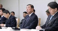 Prime Minister Shigeru Ishiba speaks at a meeting on Japan's strategy for infrastructure exports at the prime minister's office on Dec. 24, 2024. (Kyodo)