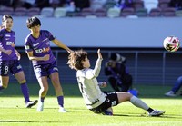 Sanfrecce Hiroshima Regina's Mami Ueno, center, scores during the first half of the WE League Cup final against INAC Kobe Leonessa at Tokyo's National Stadium on Dec. 29, 2024. (Kyodo)