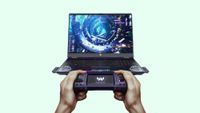 Acer Project DualPlay gaming laptop concept with hands holding a built-in gaming controller.