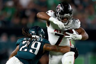  Bijan Robinson #7 of the Atlanta Falcons gets tackled by Avonte Maddox #29 of the Philadelphia Eagles during the second quarter in the game at Lincoln Financial Field on September 16, 2024