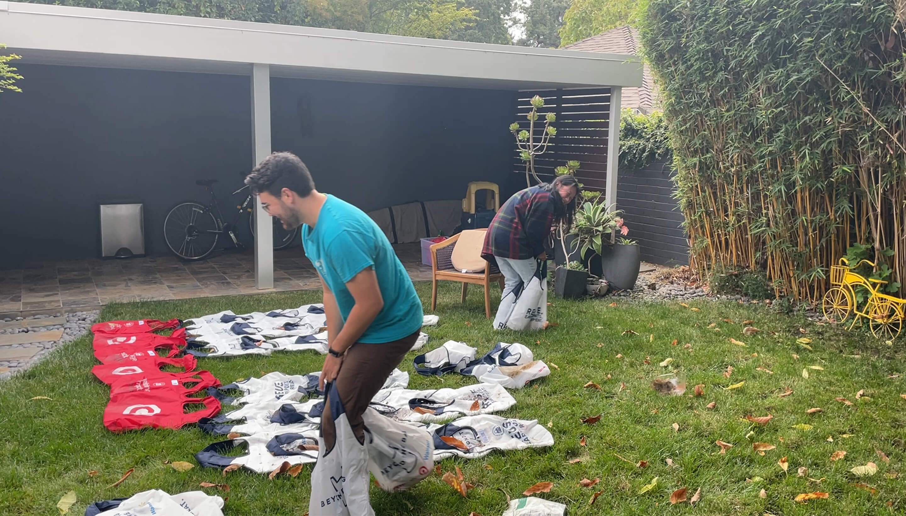 People testing a range of tote bags for durability