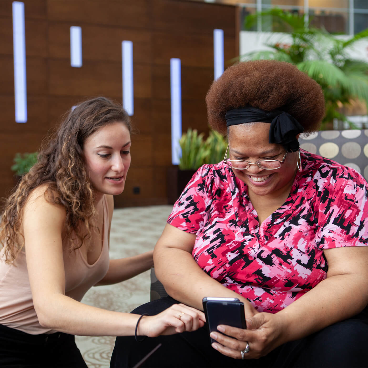 Women looking at a mobile phone