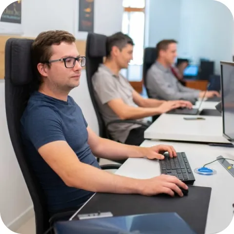 IncQuery team members working in the office