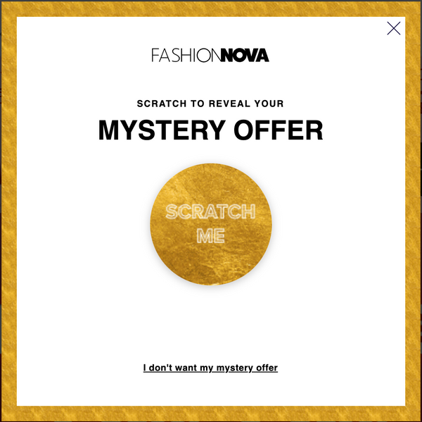 Fashion Nova pop-up window with a clickable gold circle in the center and the words “scratch me.”