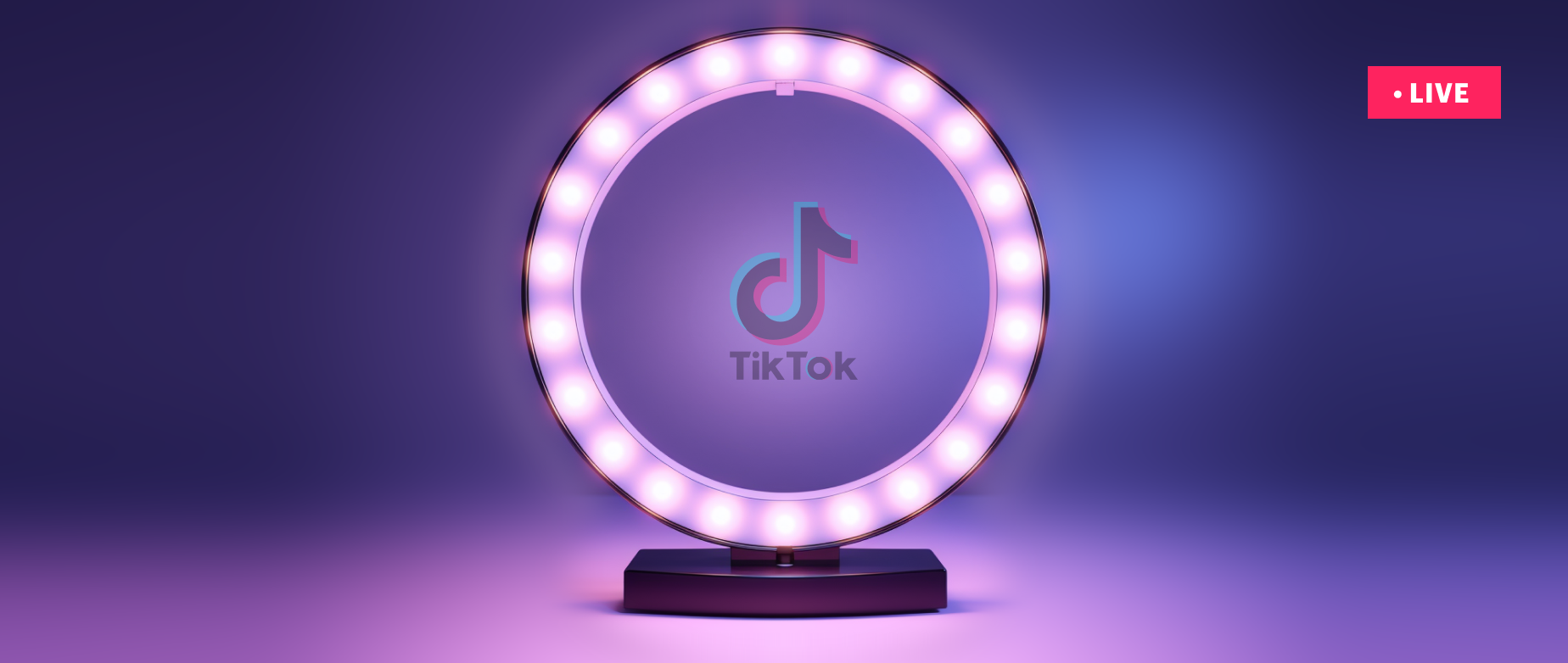 a ring light with the TikTok logo in the middle of it and a TikTok live button on the top right of the screen: how to go live on tiktok