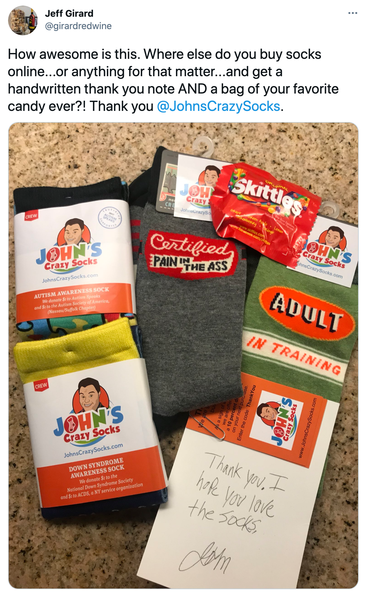 twitter post by johns crazy socks customer showing how it thanked them for their purchase with written note