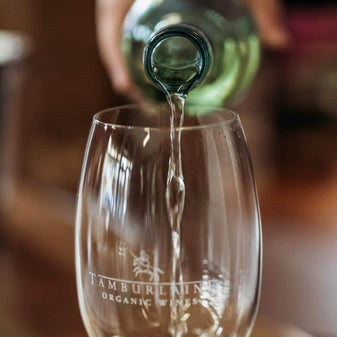 Wine being poured into a glass