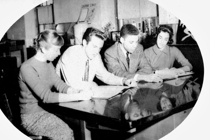 In a picture of Hugh Price from his high school yearbook, he sits with three white students, acting as the vice president for his senior class.