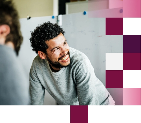 Smiling man during a meeting