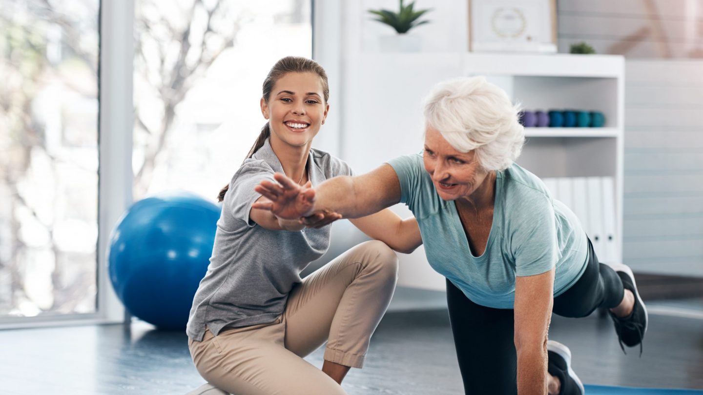 Shot of a senior woman being treated by a physiotherapist